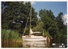 Jacht Okaz A-111, typ Karaś 450 nad brzegiem jeziora, 1987-2006 r.