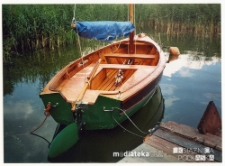 Łódka Zjawa nad brzegiem jeziora Rajgrodzkiego, 2006-2014 r.